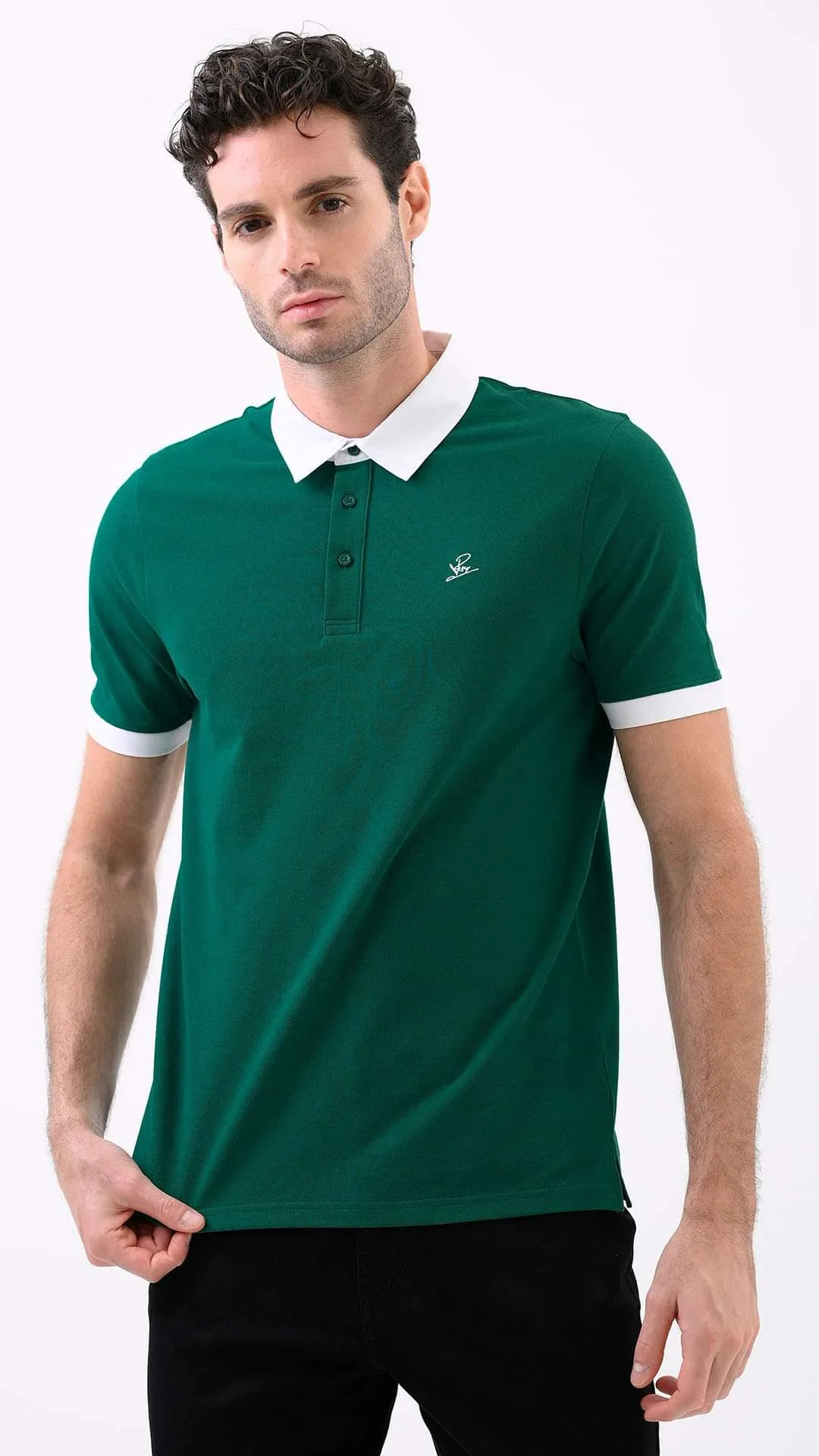 Man in a green polo shirt with a white collar on a white background